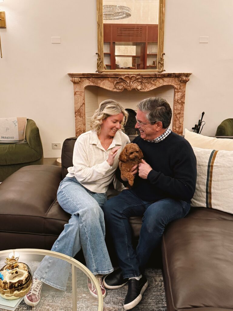 Carrie and Brian Pasch with their toy poodle Brunella